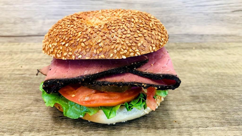 Hot Pastrami Sandwich Lunch · Bagel with heated pastrami. Comes with mayo, mustard, lettuce, tomato, onion, cucumbers, pickles, and pepperoncini.