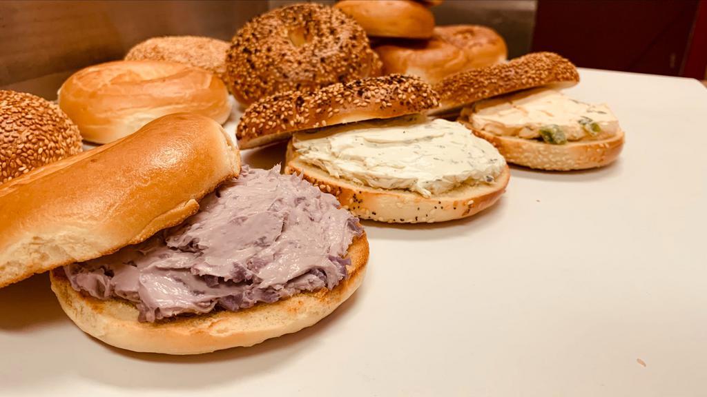 Bagel with Flavored Cream Cheese · Bagel toasted with flavored cream cheese. Cream cheese in picture is Blueberry Cream Cheese.