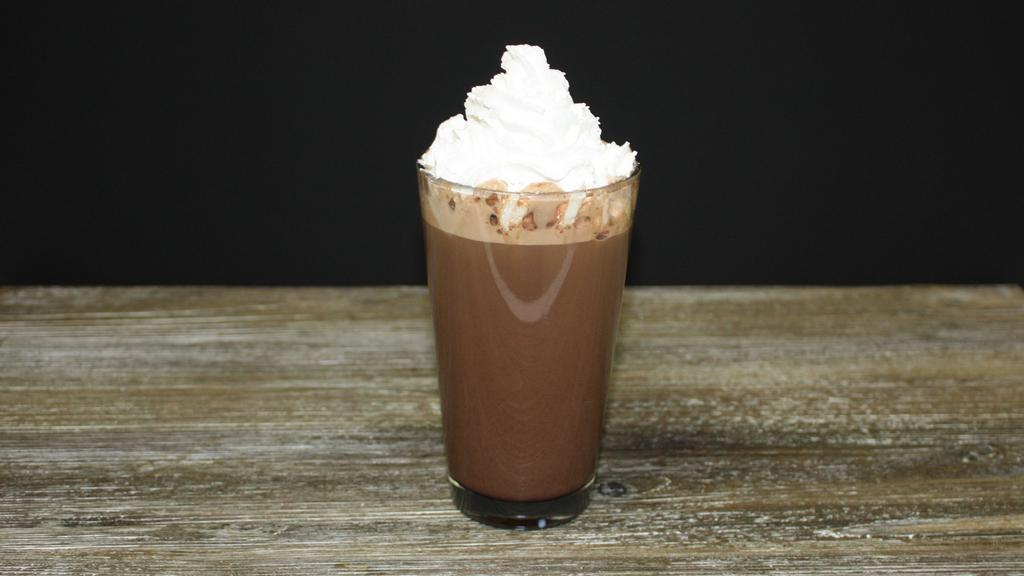 Mocha · Espresso, chocolate powder with steamed nonfat milk top with whip cream.