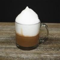 Cappuccino · Espresso, 1/3 steamed milk and 2/3 foam.