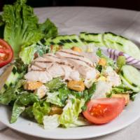 Chicken Caesar Salad · Chicken breast, romaine lettuce, crouton, parmesan cheese, cucumber and tomato mix with caes...