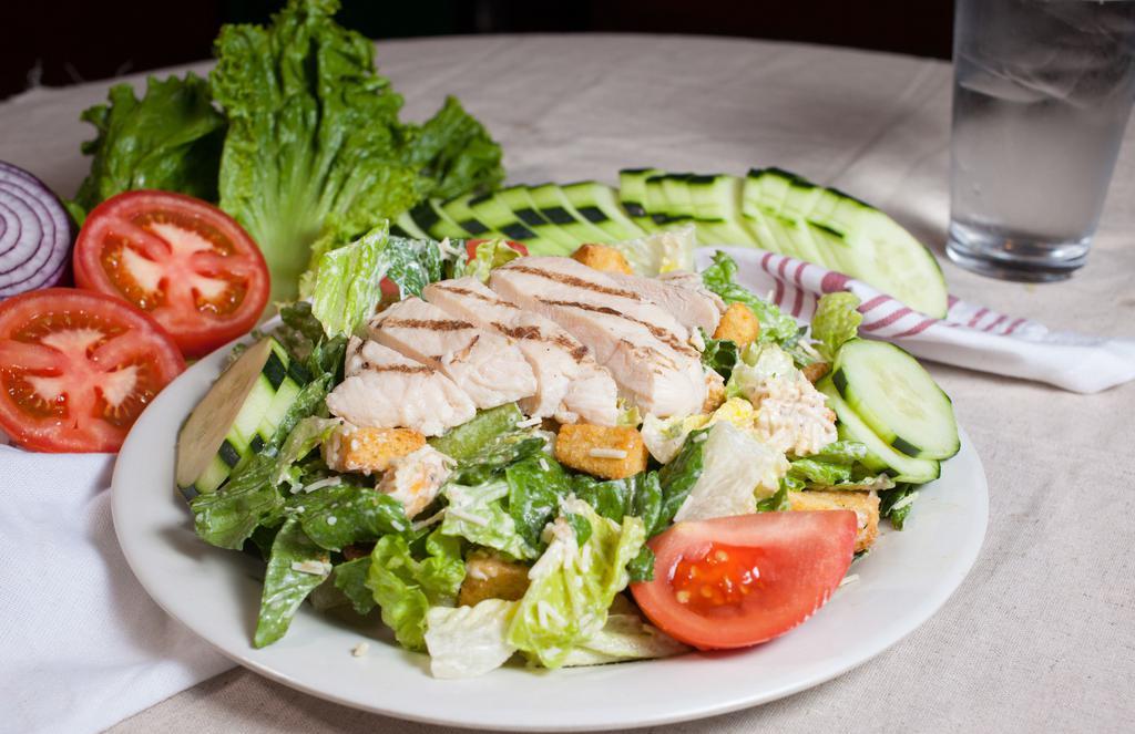 Chicken Caesar Salad · Chicken breast, romaine lettuce, crouton, parmesan cheese, cucumber and tomato mix with caesar dressing.