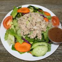 Tuna Platter · House salad top with tuna salad, cucumber and tomato with your choice of dressing.