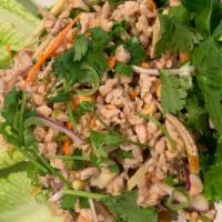 Thai Lettuce Wrap · Medium spicy. Minced chicken or tofu with ginger, peanut, chili, lime sauce, herbs, and spic...