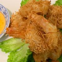 Coconut Shrimps · Crispy coconut battered shrimps with sweet sauce.
- Need extra sauce? Check our 