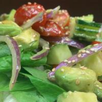 Avocado Green Salad · Vegetarian. Fresh garden green salad with avocado, tomato, cucumber, carrot and red onion to...