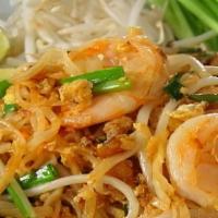 Pad Thai · Thai famous pan-fried rice noodle, egg, tofu, peanut, bean sprout, and green onion.