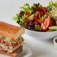 Half Sandwich Combo · Any half sandwich with character with a bowl of soup or house salad or deli salad.