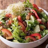 Large House Salad · Garden salad mix with tomato, cucumber, red bell pepper, clover sprouts, and topped with fre...