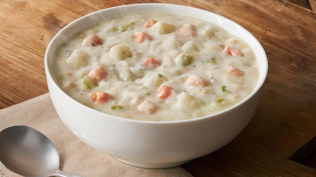New England Clam Chowder · Rich, creamy New England-style clam chowder made with chopped sea clams, fresh Yukon potatoes, garlic, onions, carrots and celery, then finished with fresh herbs, spices and a hint of cayenne. 220 cal - 500 cal
