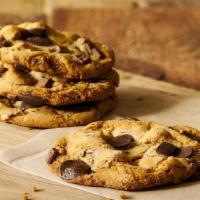 Sandy's Amazing Chocolate Chunk Manifesto Cookie · Chunks of sustainable chocolates grown in the Peruvian Andes and. pretzel bits in every bite...