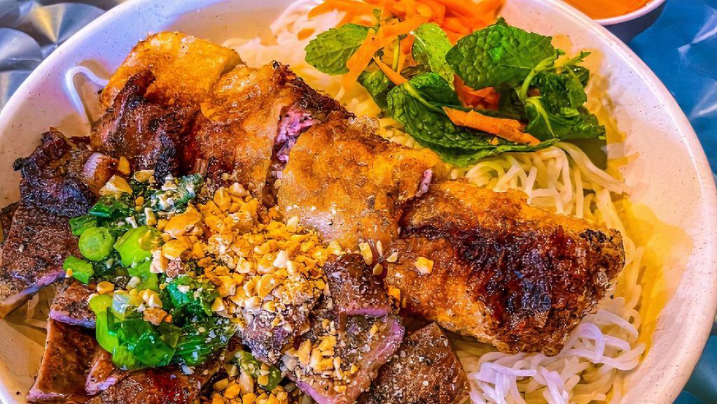 25. Cơm Bì Thịt Nướng · Pork shish kebab or shredded pork jelly over rice.