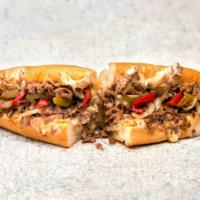 Classic Philly Cheese Steak · Steak is 100% sirloin. Chicken is 100% breast meat. Sandwiches are served on a soft Amoroso'...
