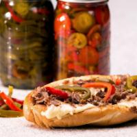 The King of Philly · Our Classic Philly Cheese Steak with 50% more Meat & Cheese! Choice of hot peppers, sweet pe...
