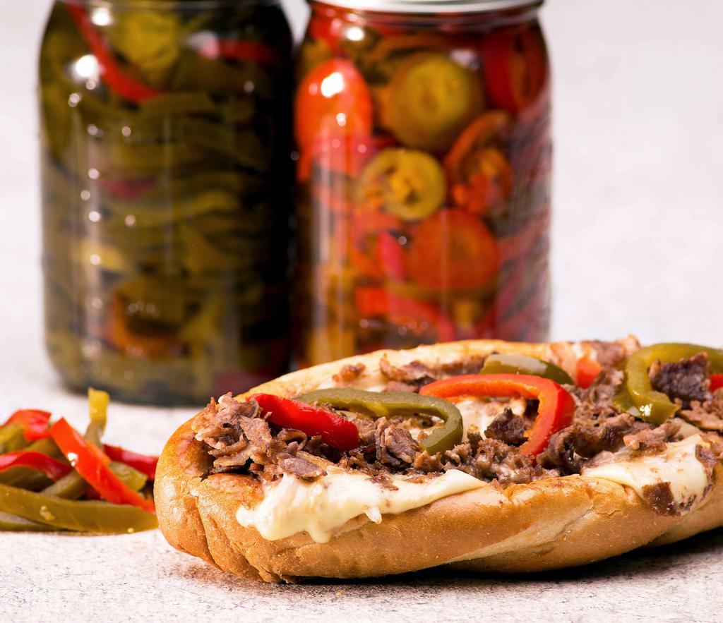 The King of Philly · Our Classic Philly Cheese Steak with 50% more Meat & Cheese! Choice of hot peppers, sweet peppers and/or onions