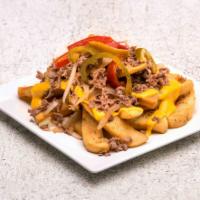 Philly Cheese Fries · Steak fries topped with steak or chicken and cheddar cheese sauce and choice of grilled onio...