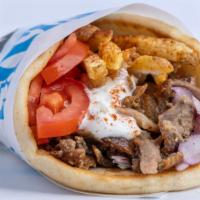 Pork Belly Gyro Pita · Thin slices of seasoned pork, stacked and cooked on a vertical rotisserie, served on a warm ...