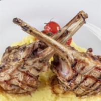 Lamb Rack Plate · Grilled and Seasoned Lamb Rack cooked to perfection. Comes with Steamed Sautéed Vegetables a...