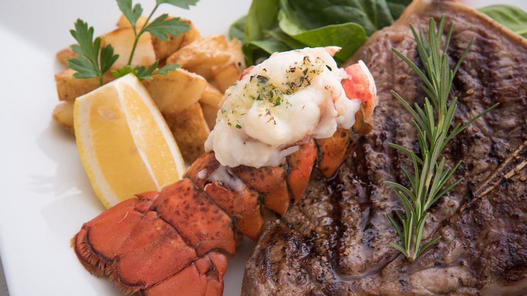 New York Steak & Lobster · Juicy, tender New York Steak loaded with flavor, partnered with a tender and buttery Lobster Tail. Comes with Steamed Sautéed Vegetables and your choice of Creamy Mashed Potatoes with Gravy or Roasted Yams.