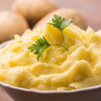 Mashed Potatoes & Gravy · Creamy Mashed Potato Topped with Gravy