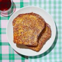 Le Classique French Toast · Say “Bonjour!” to a classic. Thick slices of soft and spongy bread dipped in egg, cream, cin...