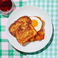 Le Potato, Egg, and Cheese French Toast Sandwich · Home fries, fried egg, and cheddar cheese sandwiched between 2 slices of classic French toas...