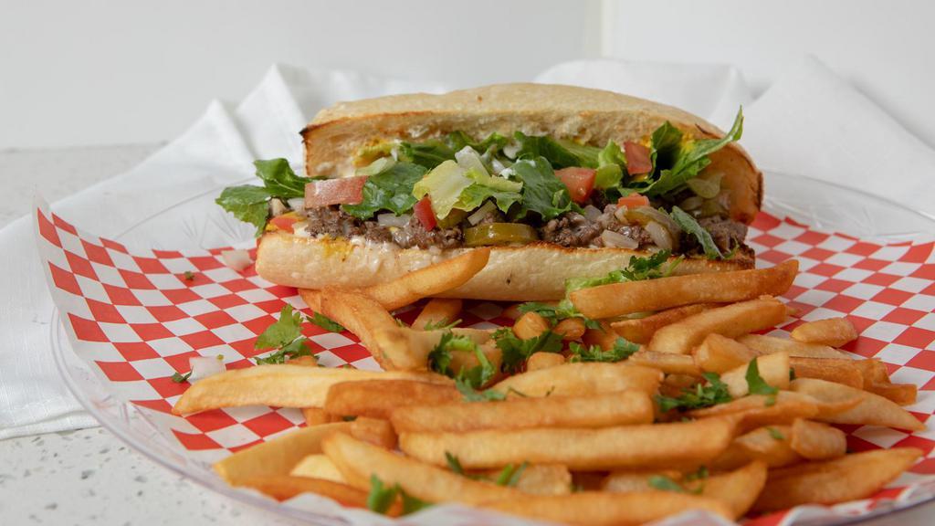 Steak Hoagie · Mayo, mustard, mozzarella cheese, grilled jalapenos grilled onions, lettuce, tomatoes.