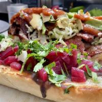 Tortas · Yucatecan Torta with black bean or mayo spread, cabbage, Pickled red onions, and salsa