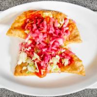 Empanada · Fried corn Masa filled with mozzarella cheese, ground pork, or Chicken. Topped with cabbage,...