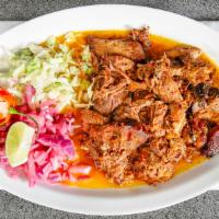 Cochinita Pibil · Pulled pork marinated in achiote paste. Served with red onion, cabbage. 6 freshly handmade t...