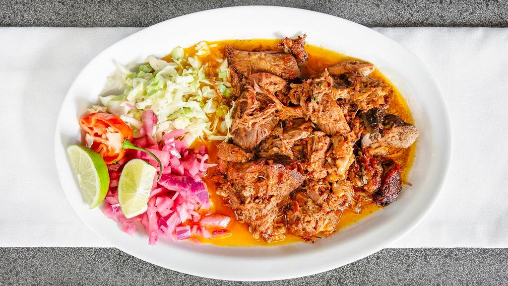Cochinita Pibil · Pulled pork marinated in achiote paste. Served with red onion, cabbage. 6 freshly handmade tortillas included.