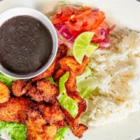 Pollo Empanizado · Breaded chicken. Served with cabbage, tomato, onion, fried beans, rice. 6 freshly handmade t...