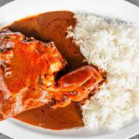 Mole · Chicken with spicy mole sauce. Served with rice and 6 freshly handmade tortillas included.