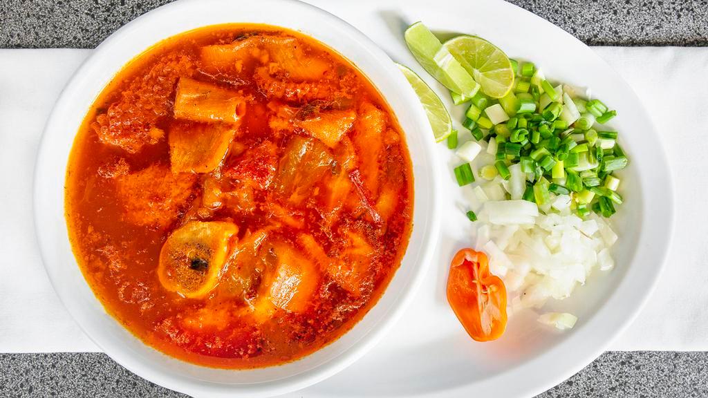 Mondongo · Beef belly soup. Flavored with achiote seasonic. Served with green onion, white onion, lemon, chili. 6 freshly handmade tortillas included.
Also known as Menudo
