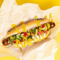 Chicago Dog · Hot dog topped with relish, mustard, diced white onion, tomato, and pickles, served on a flu...