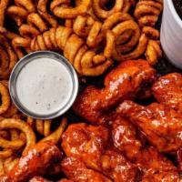 16  Bone-In Wings Combo · 16 bone-in wings tossed with your choice of 2 flavors. Served with curly fries, a side of ra...