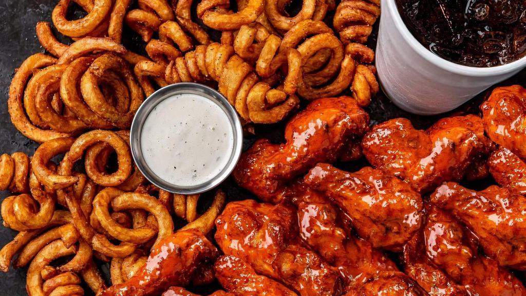 16  Smoked Bone-In Wings Combo · 16 bone-in wings smoked in-house over pecan wood then tossed with your choice of 2 flavors. Served with curly fries, a side of ranch & a drink.