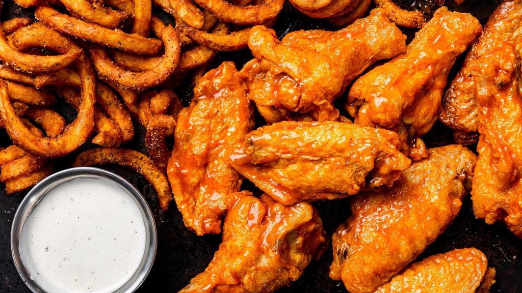 8 Bone-In Wings · 8 bone-in wings, served with curly fries  & a side of ranch.