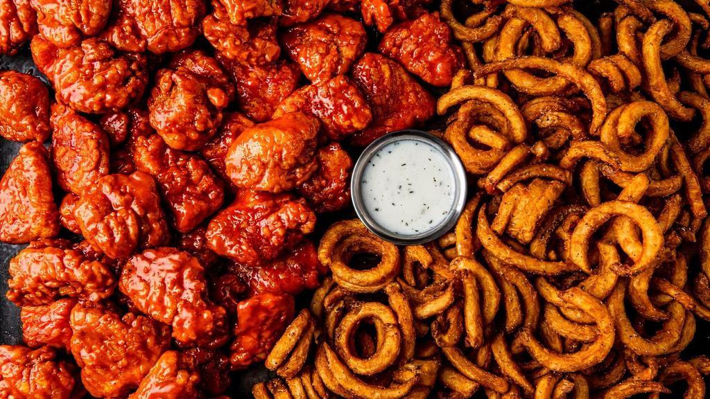 44 Boneless Wings · 44 boneless wings tossed in your choice of 4 flavors. Served with curly fries & a side of ranch..