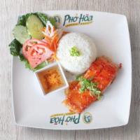 Sweet-Chili Salmon · Salmon fillet served with pickled cauliflower, carrot, and chili sauce on the side.