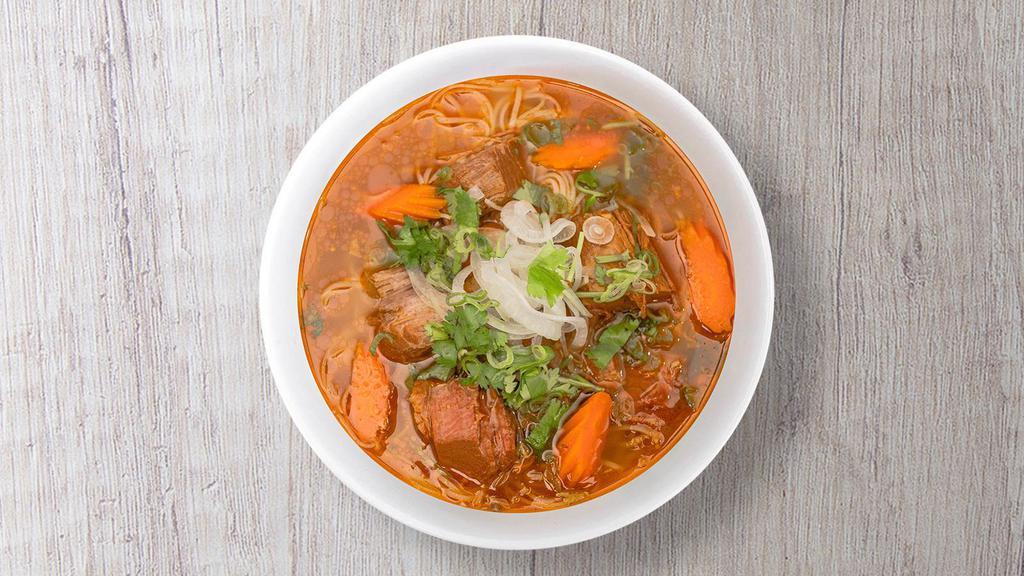 Vietnamese Beef Stew · Carrot beef stew served with noodles.