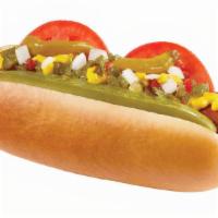 Chicago Veggie Dog · A Veggie Dog in a fresh, steamed bun topped with tomato, chopped onions, pickle spear, relis...