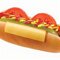 Backyard Veggie Dog · A Veggie Dog in a fresh, steamed bun topped with a slice of American cheese, tomato, a pickl...