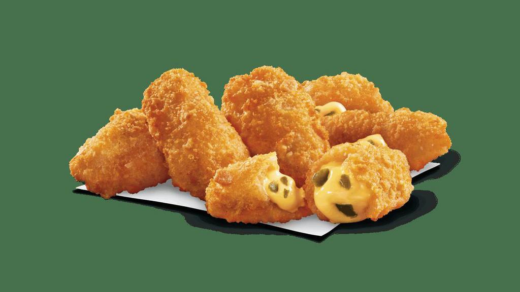 Jalapeño Poppers · Golden brown poppers stuffed with diced jalapeños and cheddar cheese. Comes with side of ranch dressing.