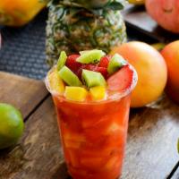Escamocha · Seasonal fruit with a mix of orange juice strawberry sweetnes salt lime and chili