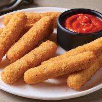 Mozzarella Sticks · Crispy outside with melty Mozzarella inside, this favorite is served with marinara sauce.