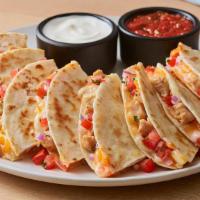 Chicken Quesadilla · Warm, grilled tortillas are loaded with chipotle lime chicken, house-made pico de gallo and ...