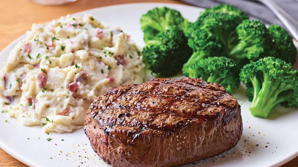 8 Oz. Top Sirloin* · Lightly seasoned USDA Select top sirloin* cooked to perfection and served hot off the grill. Served with garlic mashed potatoes and steamed broccoli.