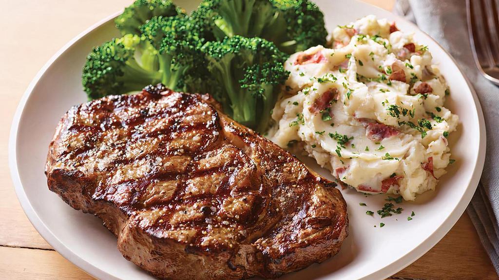 12 Oz. Ribeye* · Rich, tender and juicy.  Our marbled, USDA Select Ribeye Steak* is served hot off the grill.  Served with garlic mashed potatoes and steamed broccoli.