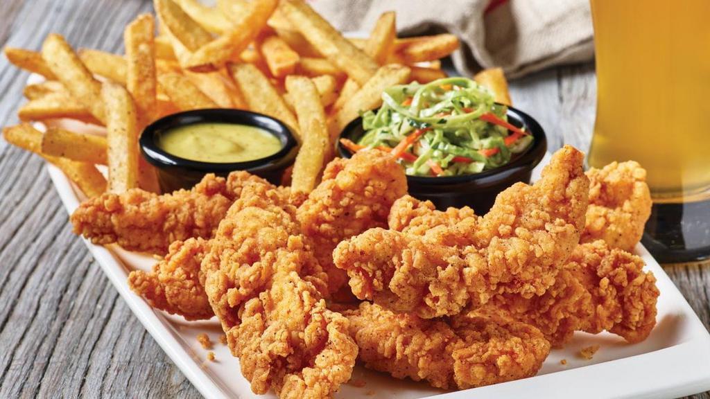 Chicken Tenders Platter · Crispy breaded chicken tenders are a grill and bar classic. Served with signature coleslaw and fries and choice of dipping sauce.
